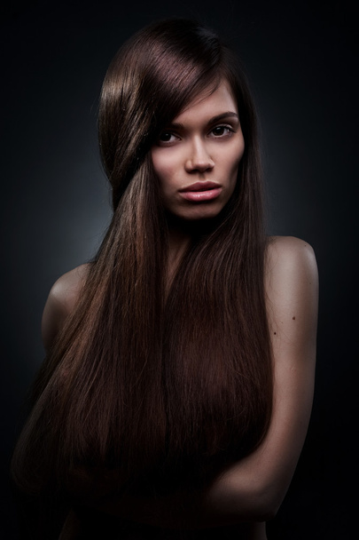 Beautiful woman with long hair - Фото, зображення