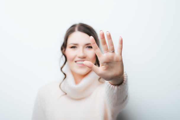 woman showing stop gesture - Fotó, kép