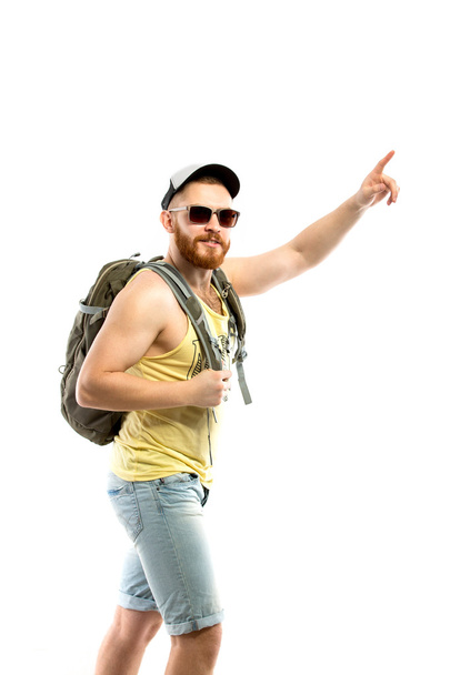 Side view of bearded traveler in sunglasses with backpack - Foto, Imagem