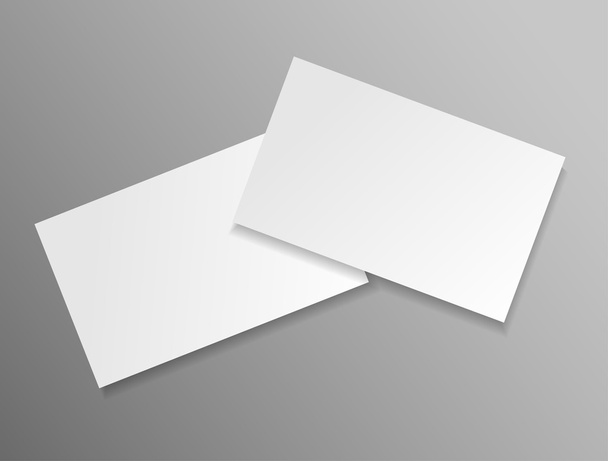 blank business cards on grey background - Wektor, obraz