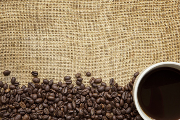 Coffee Beans and Cup over Burlap - Foto, Bild