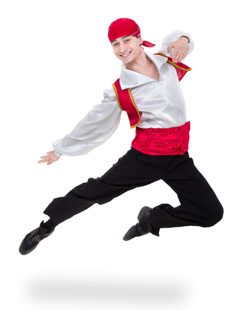 Dancing man wearing a toreador costume jumping. Isolated on white in full length. - Foto, afbeelding