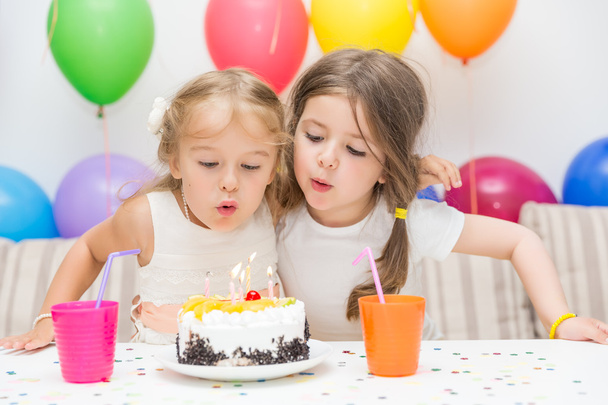 Two little girls at a birthday party - Fotoğraf, Görsel