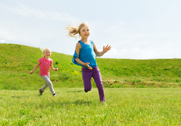 group of happy kids running outdoors - Foto, immagini
