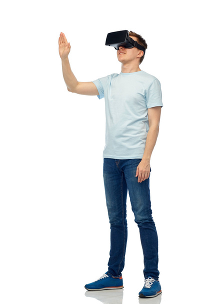 happy man in virtual reality headset or 3d glasses - Photo, image