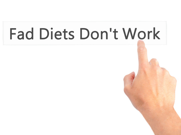 Fad Diets Don 't Work - Mão pressionando um botão no backgro borrado
 - Foto, Imagem