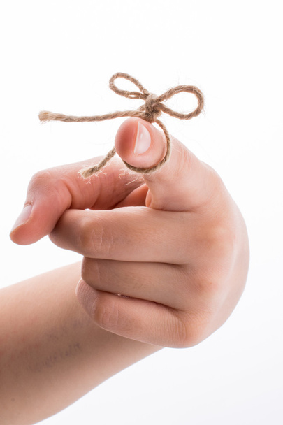 Hand tied with a ribbon - Fotografie, Obrázek