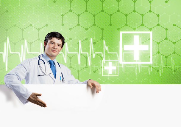 Doctor with white blank banner - Photo, image