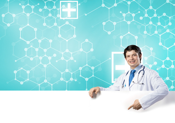 Doctor with white blank banner - Foto, imagen