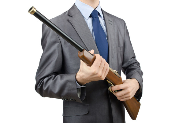 Бизнесмен с пистолетом изолирован на белом
 - Фото, изображение