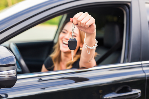 Young Happy Woman Showing The Key Of New Car - Fotografie, Obrázek
