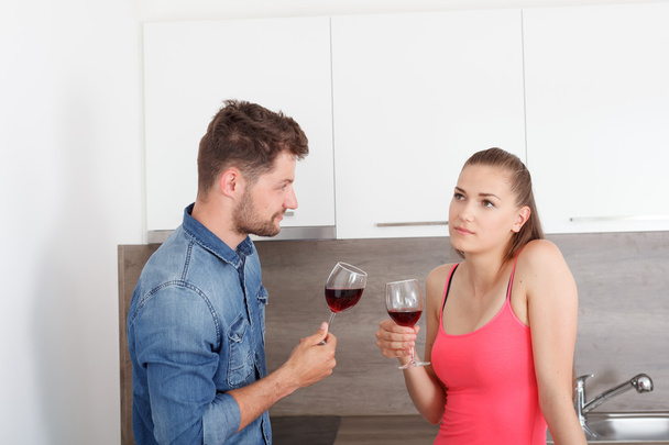 Young couple with a glass of red wine. - Photo, Image