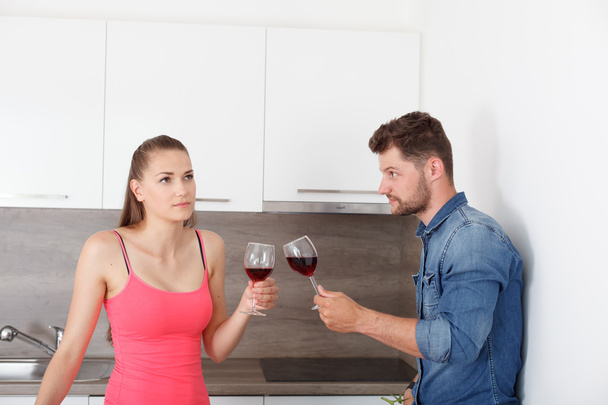 Young couple with a glass of red wine. - Foto, Imagem