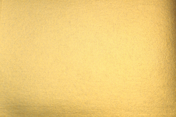 Χρυσό γυαλιστερό χαρτί επιφάνεια  - Φωτογραφία, εικόνα