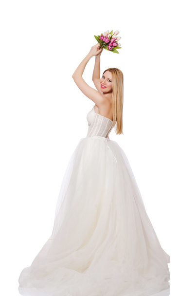 Bride with flowers isolated on white - Fotó, kép