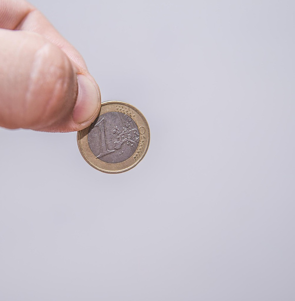 hand holding one euro coin - Fotografie, Obrázek
