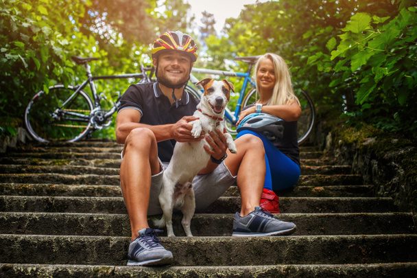 Couple posing with their dog - Photo, Image