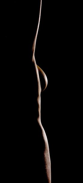 Shape of naked woman in darkness - Фото, зображення