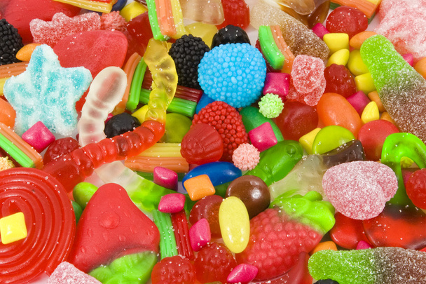 Солодкий асортимент різнокольорових цукерок
 - Фото, зображення