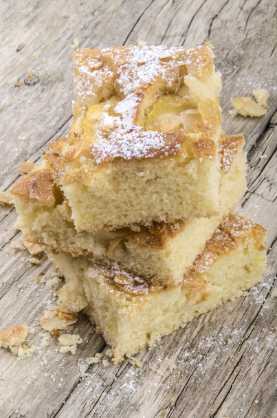 Freshly baked apple cake with almond flakes - Photo, Image