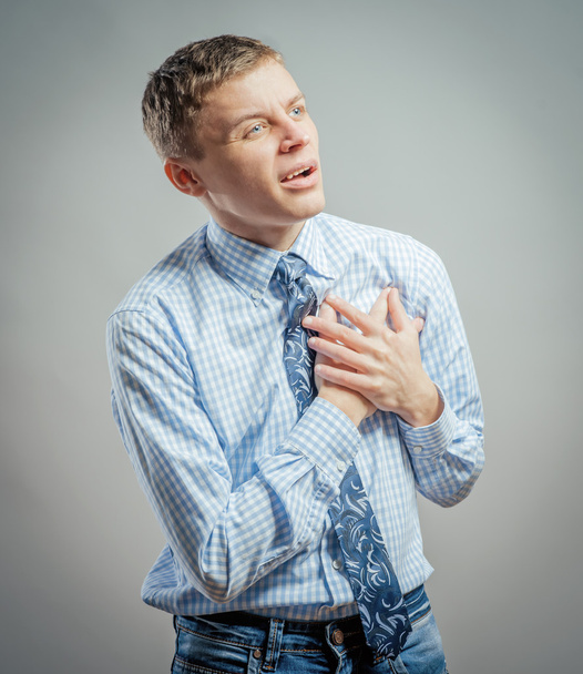  man with chest pain  - Foto, afbeelding