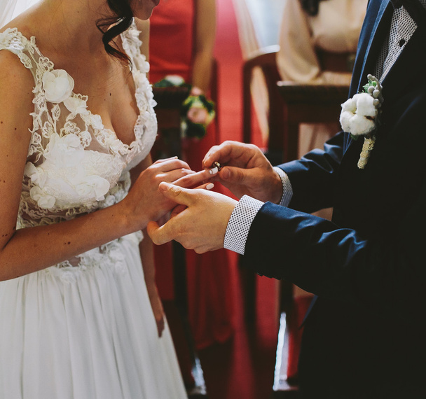 Putting the wedding ring on - Photo, Image