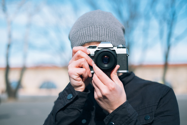 male photographer with a camera - Фото, зображення