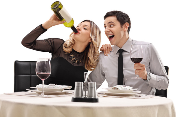 Couple drinking wine from a bottle  - Photo, Image