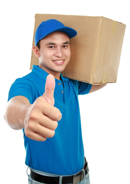Delivery man thumb up - Photo, image