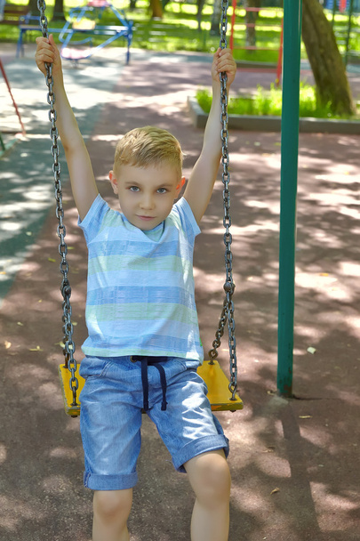 Adorable boy portrait in the playground - Фото, зображення