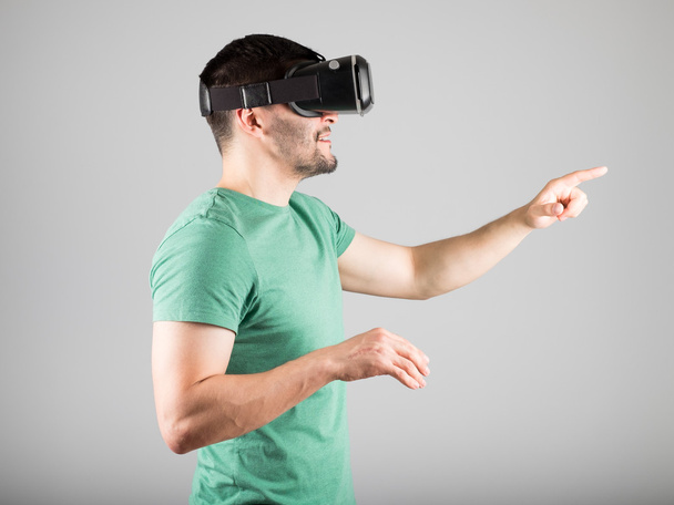 Man using virtual reality glasses - Photo, image