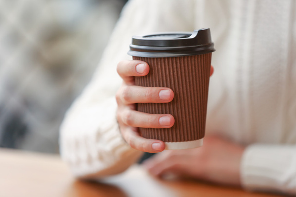 Young woman drinking coffee - Фото, зображення