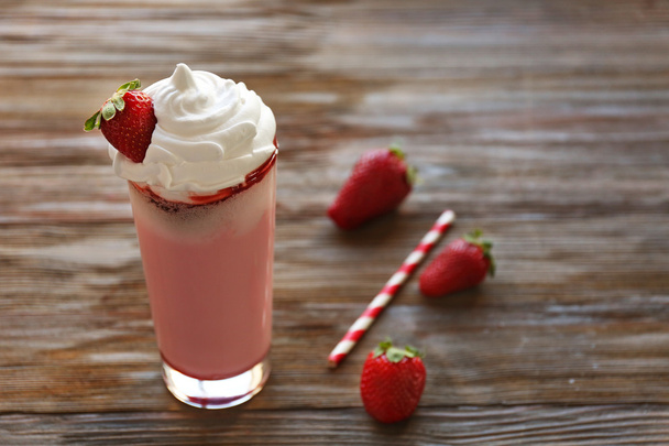 Delicious strawberry milkshake  - Фото, изображение