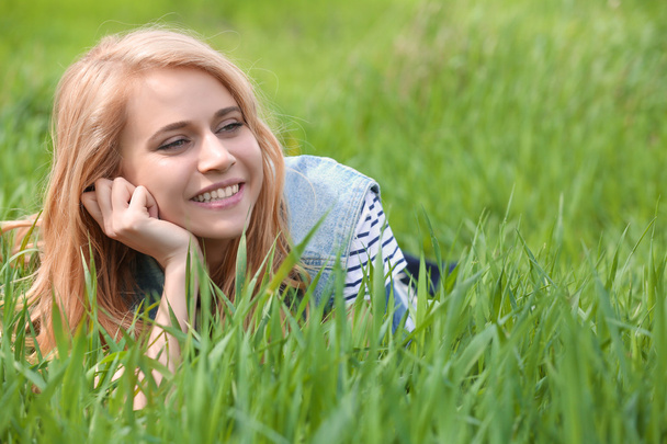 woman on green grass - Fotografie, Obrázek
