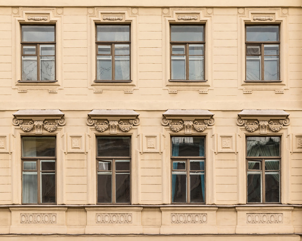 Windows in a row on facade of the Saint-Petersburg University of Economics - Valokuva, kuva