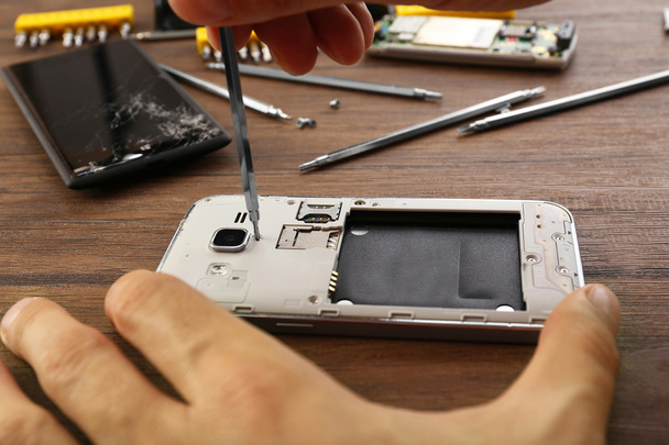 Mobile phone repair - Фото, изображение