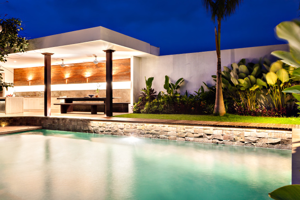 Modern home with a style swimming pool at night  - Photo, Image