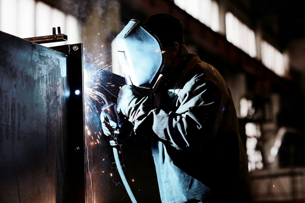 welder working at the factory - Фото, изображение
