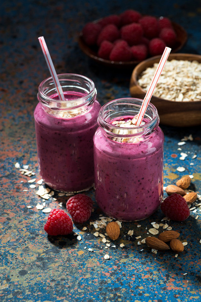 healthy berry smoothies with oatmeal in bottles - Foto, Imagem