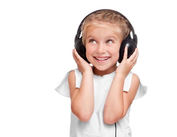 Little girl with headphones - Foto, afbeelding