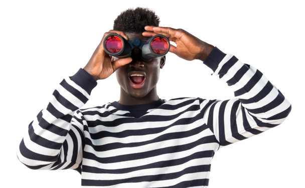 Handsome black man with binoculars - Photo, Image