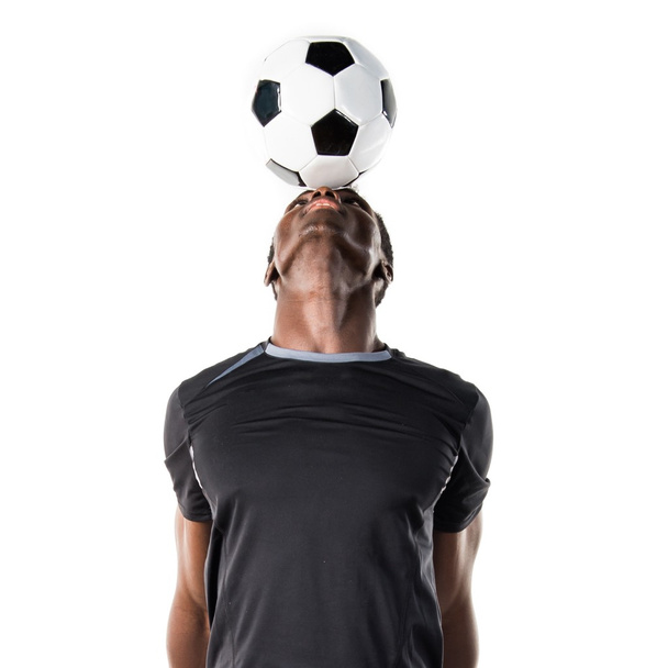 Black man playing football - Foto, immagini