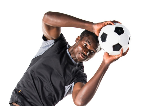 Black man playing football - Foto, afbeelding