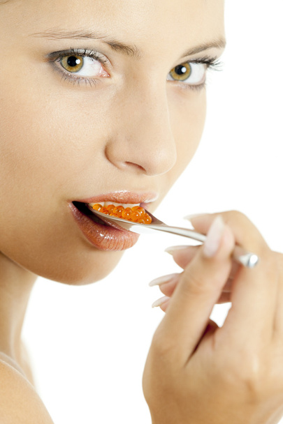Portrait of woman with red caviar - Photo, Image