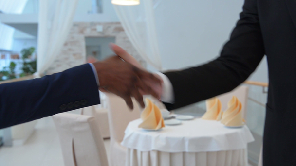 Handshaking of two businessmen - Footage, Video
