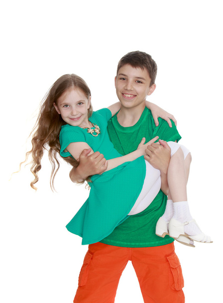 Brother carry sister - Foto, Imagen