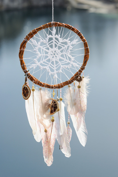 Handmade native american dream catcher on background of rocks an - Photo, Image