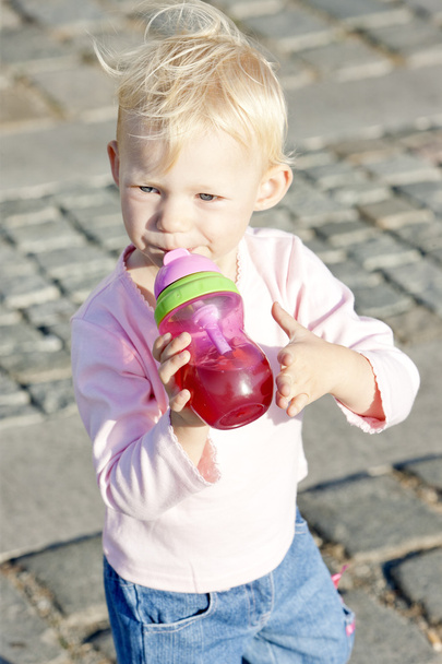 Portrait of little girl drinking tea - Zdjęcie, obraz