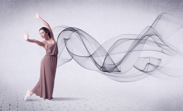 Modern ballet dancer performing with abstract swirl - Foto, Imagem