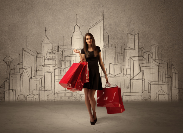 Shopping girl con borse in città disegnata - Foto, immagini